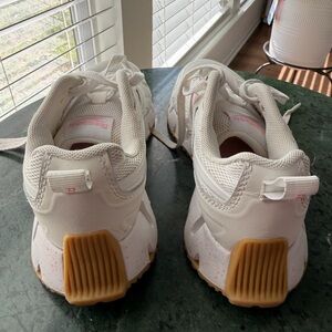 Reebok Kids White Sneakers with Pink Accents and Gum Soles